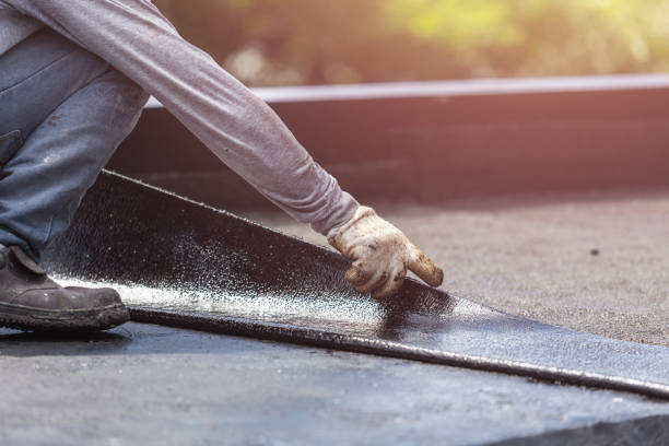 Professional Basement Waterproofing technician working in King, WI